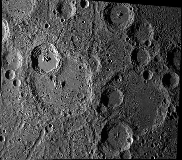 Craters of various sizes dot the landscape of Mercury