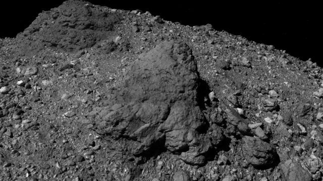 Black and white image of Bennu's rocky surface