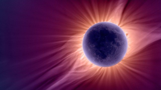 A purple Moon with a bright white, wispy solar atmosphere billowing out around it. It fills the red and purple background.