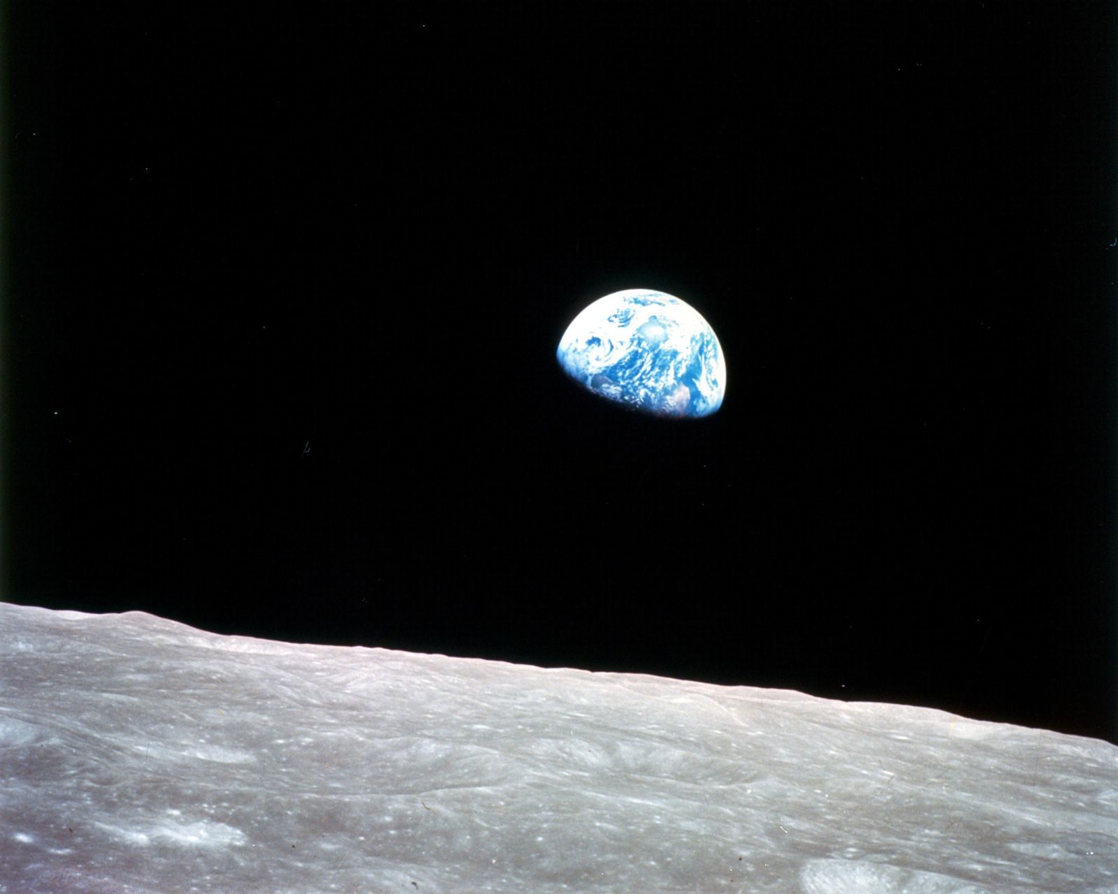 Earth rising over the Moon