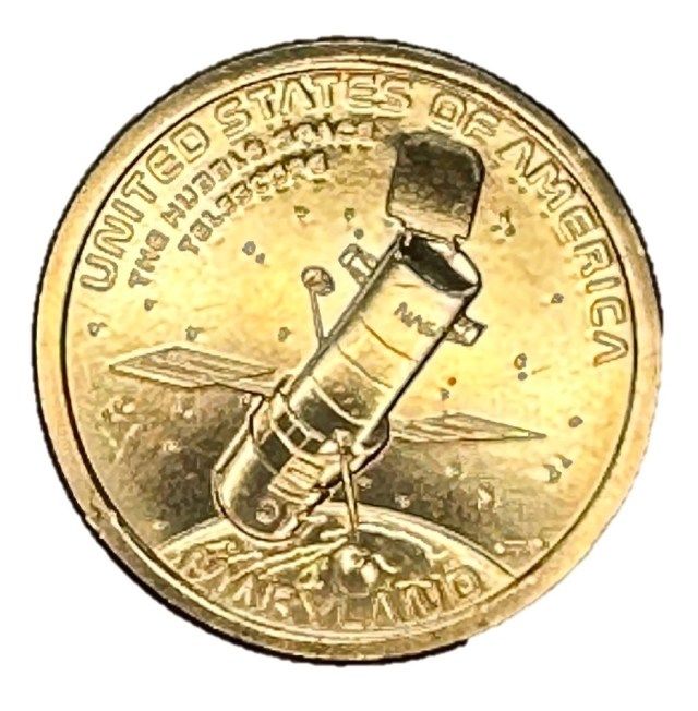 A gold coin is stamped with an image of Hubble floaing over Earth.