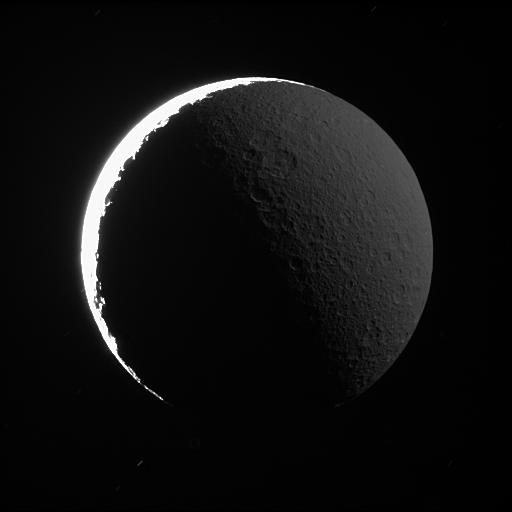 Rhea in Saturnshine - NASA Science