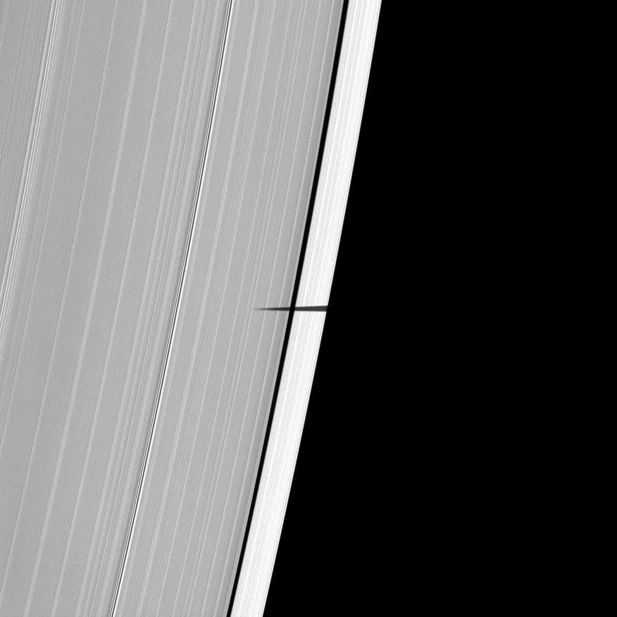 For the first time, the Cassini spacecraft captures the shadow of Saturn's tiny moon Pandora sneaking onto the planet's main rings.