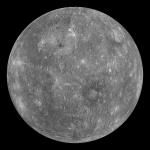 A full globe view of gray-colored planet Mercury as seen from a spacecraft. Craters and white patches also are visible.