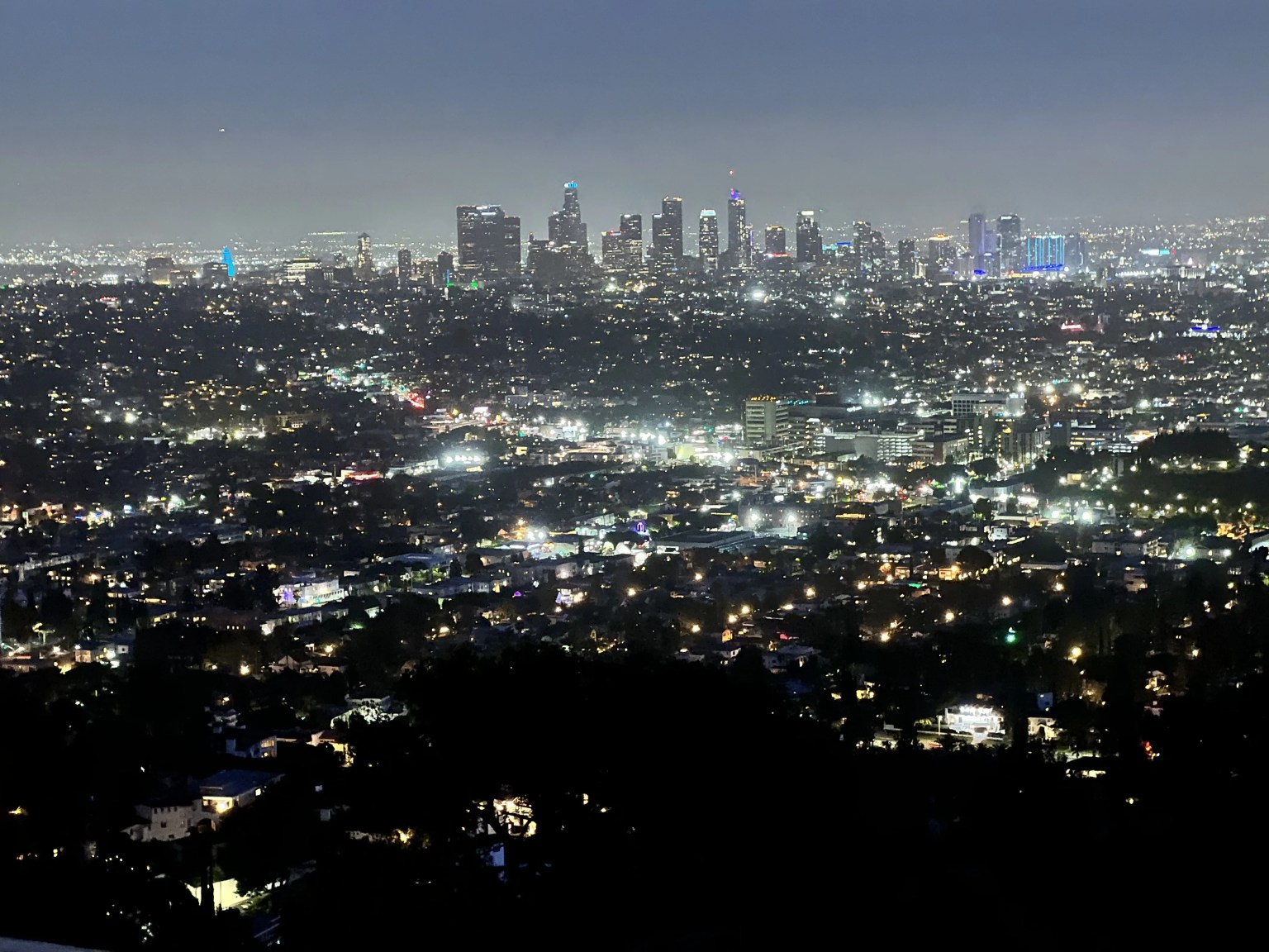 An late evening image of Los Angeles showcasing the many lights around the area