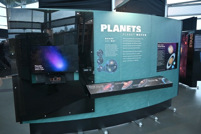 The Hubble Traveling Exhibit station that tells the story of our solar system and its planets is on display at a science center