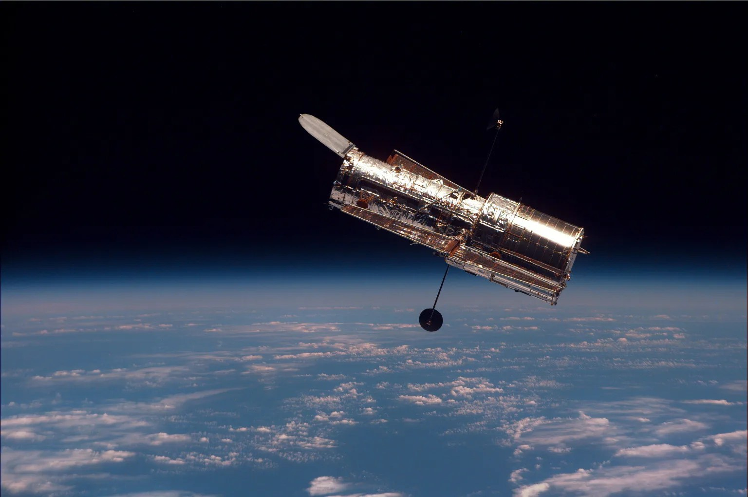 Hubble orbiting above earth