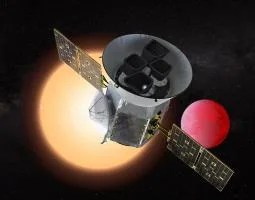 Artist concept of Tess satellite with red planet in background