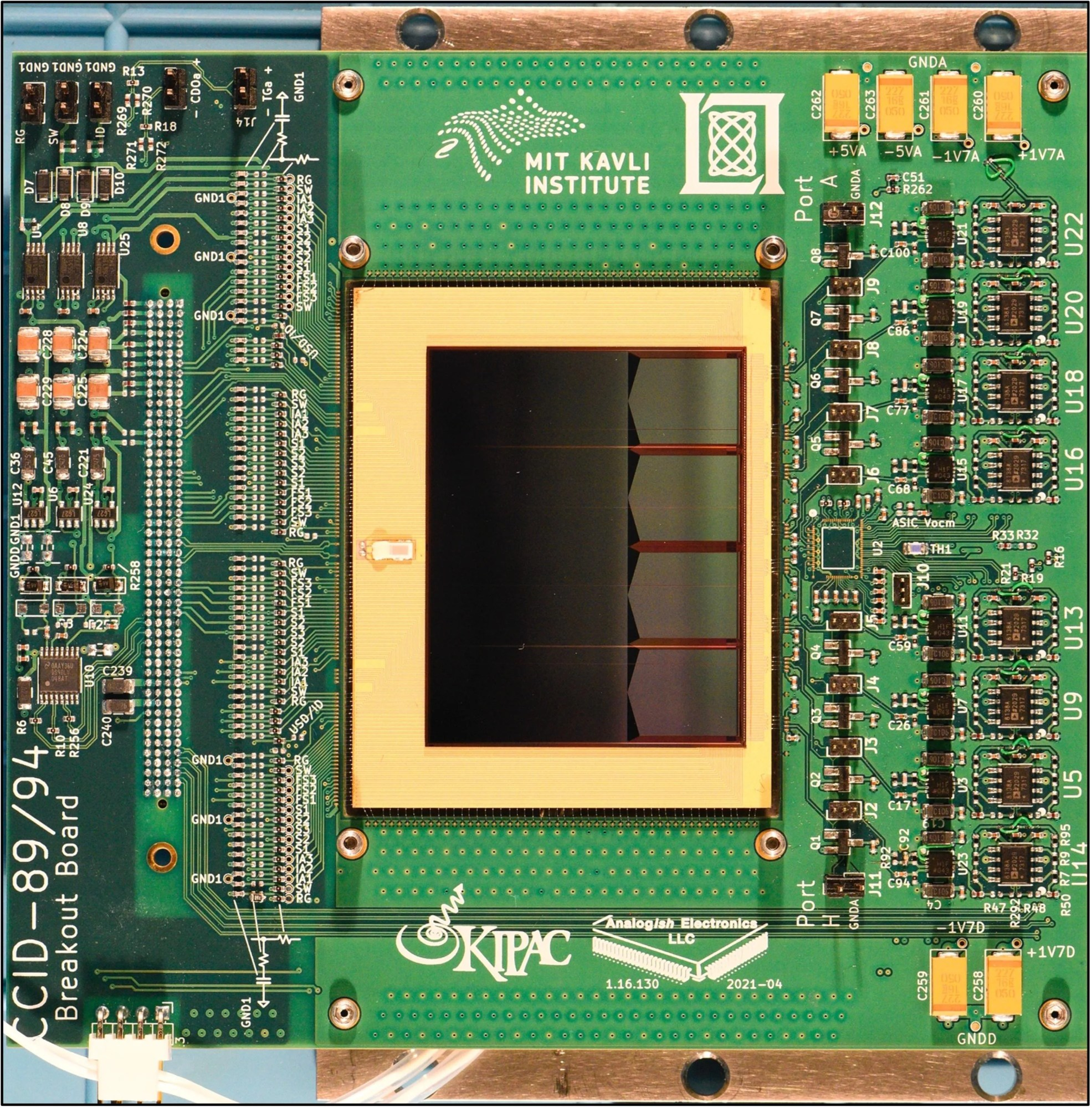 Close up photo of a green and gold image sensor with numbers and text on it.