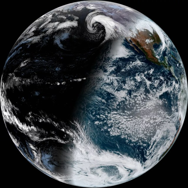 GOES West full disk image of the Earth half in day light and half in darkness.