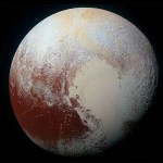 Color enhanced image of Pluto that shows a heart shape.