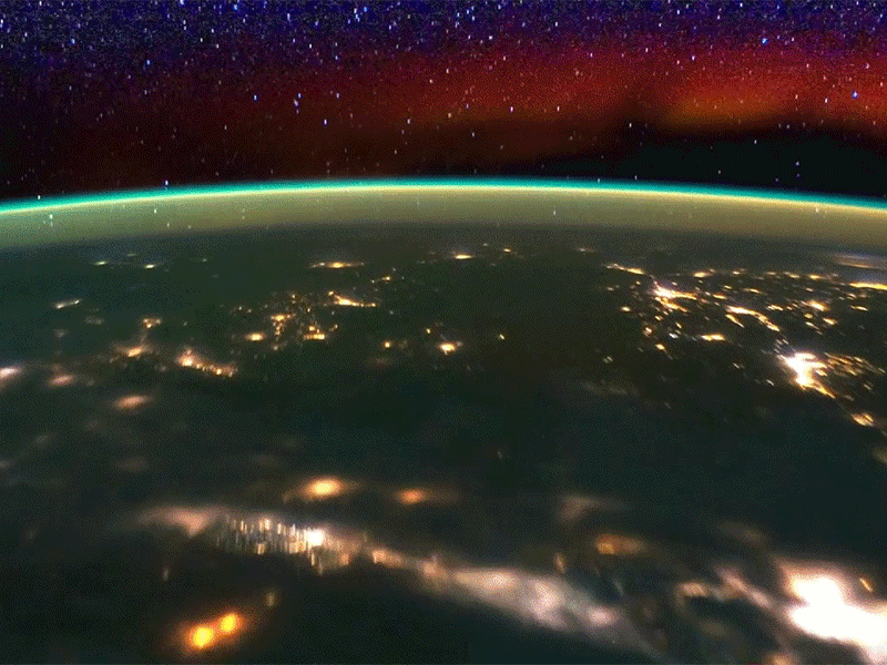 Glowing bands over Earth at night.