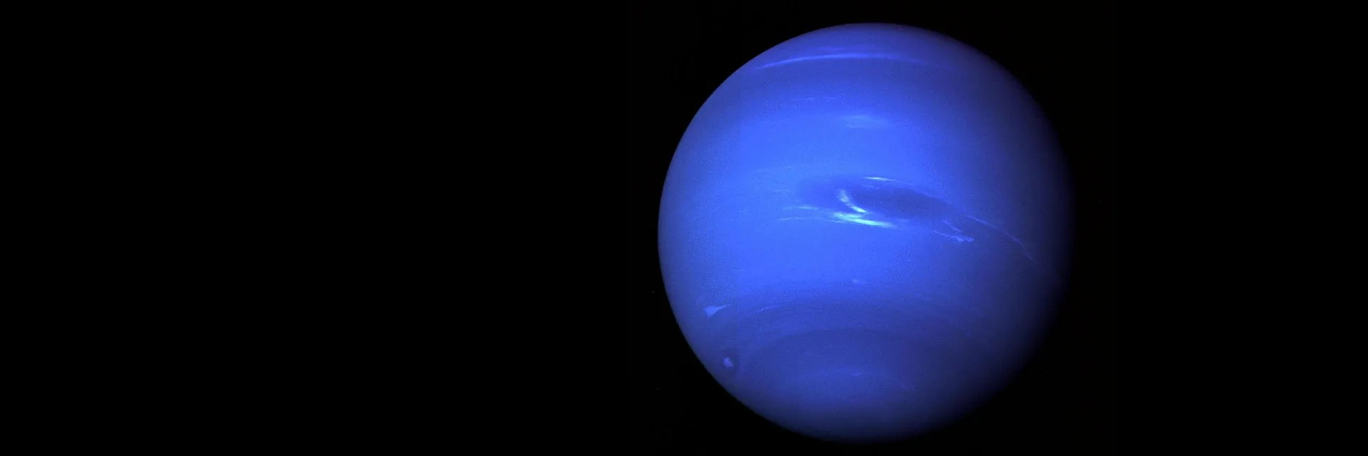 Full globe image of Neptune against the blackness of space.