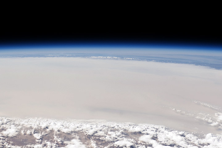 Astronaut photograph of dust over the Taklamakan Desert.