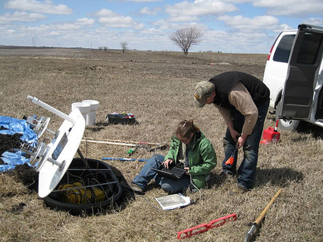April 23, 2013. Setting up another rain gauge and soil moisture platform for IFloodS. Credit: Iowa Flood Center