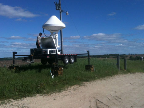 Vijay Mishra stands ont he platform of the X-Band radar.