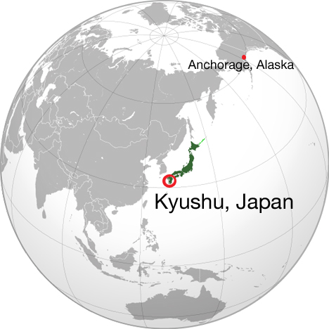 World map showing Kyushu, Japan and our layover location in Anchorage, Alaska. Credit: Wikipedia commons