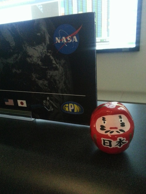 The Daruma doll in the Mission Operations Center at Goddard Space Flight Center in Maryland, the eye colored in post-solar array deploy. Credit: Eish Patel