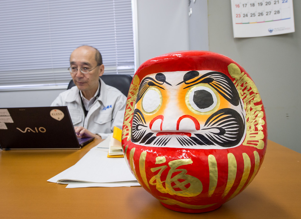 A daruma doll is seen on the desk of Masahiro Kojima, GPM Dual-frequency Precipitation Radar project manager, Japan Aerospace Exploration Agency (JAXA), at the Tanegashima Space Cener's Range Control Center (RCC), Wednesday, Feb. 26, 2014, Tanegashima, Japan. 