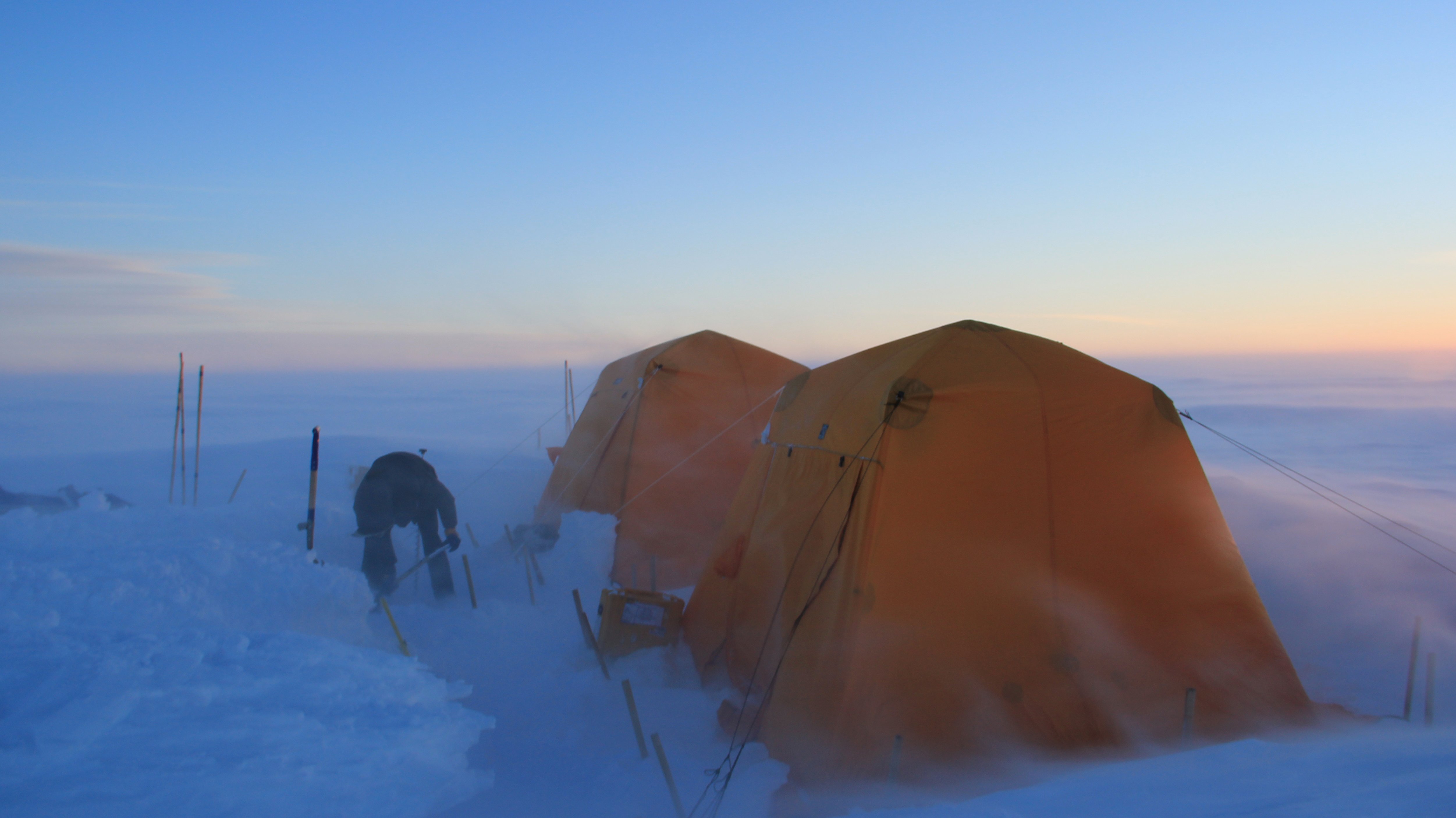 Shoveling, a typical activity at camp. Luckily this year we did not have to shovel too much to maintain our tents.