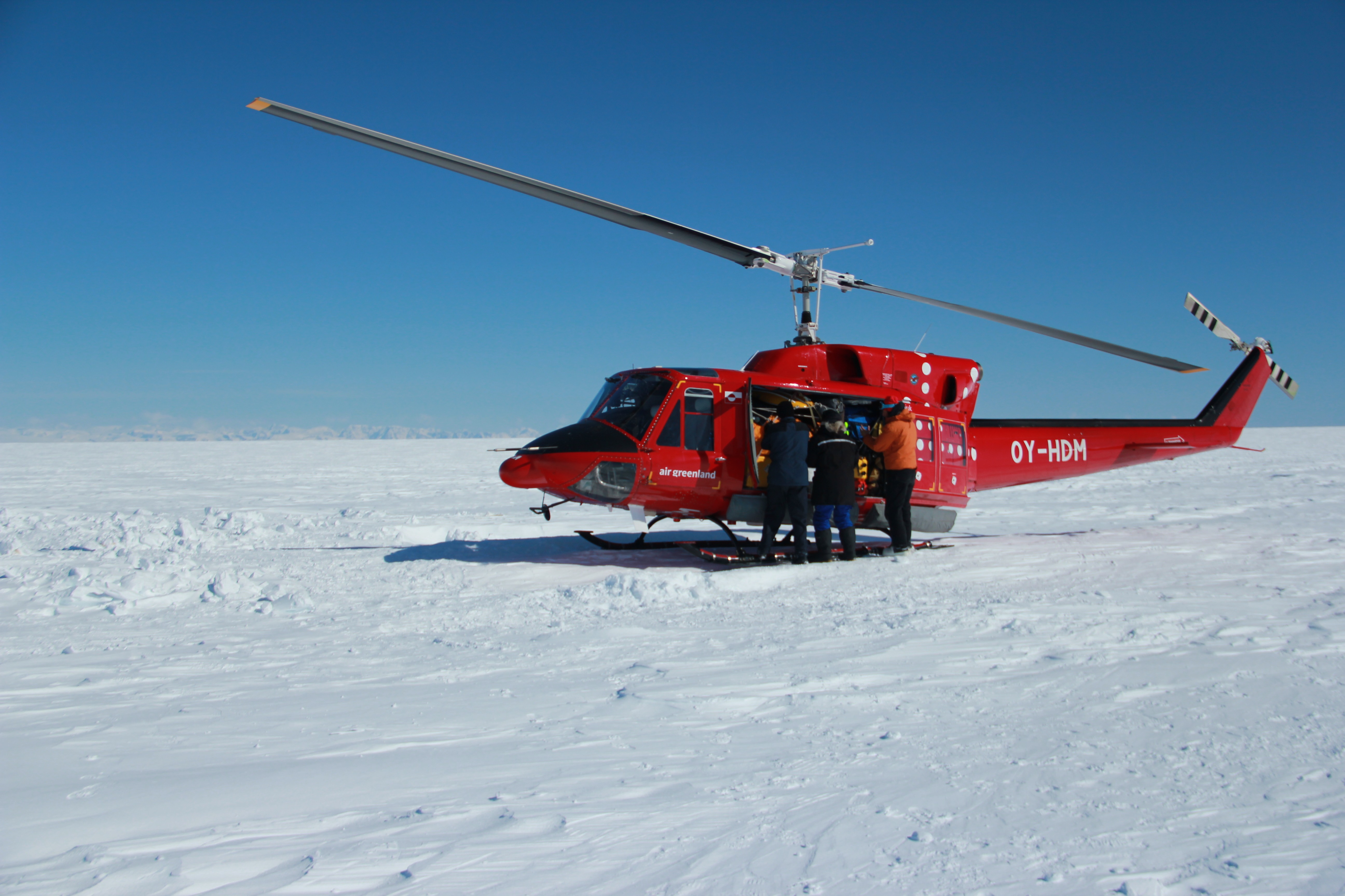 The crew and Ludo finish up loading the B-212.
