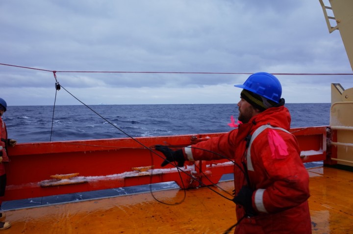 Mike Novak pulling the radiometer back to the surface Photo credit: Isabella Rosso