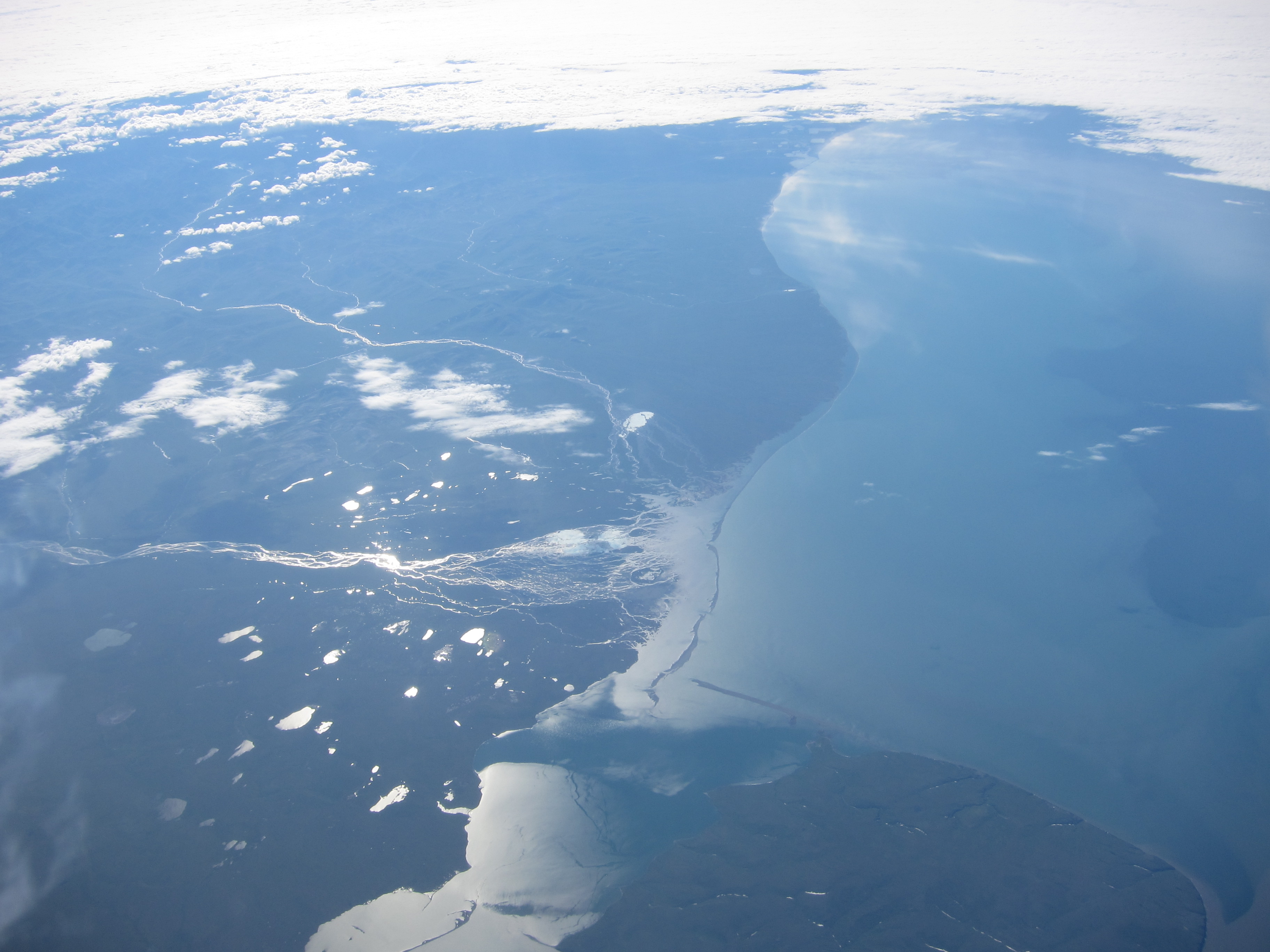 The view of Alaska from the cockpit, as Tim Williams returns from the North Pole. (Credit: Tim Williams/NASA)