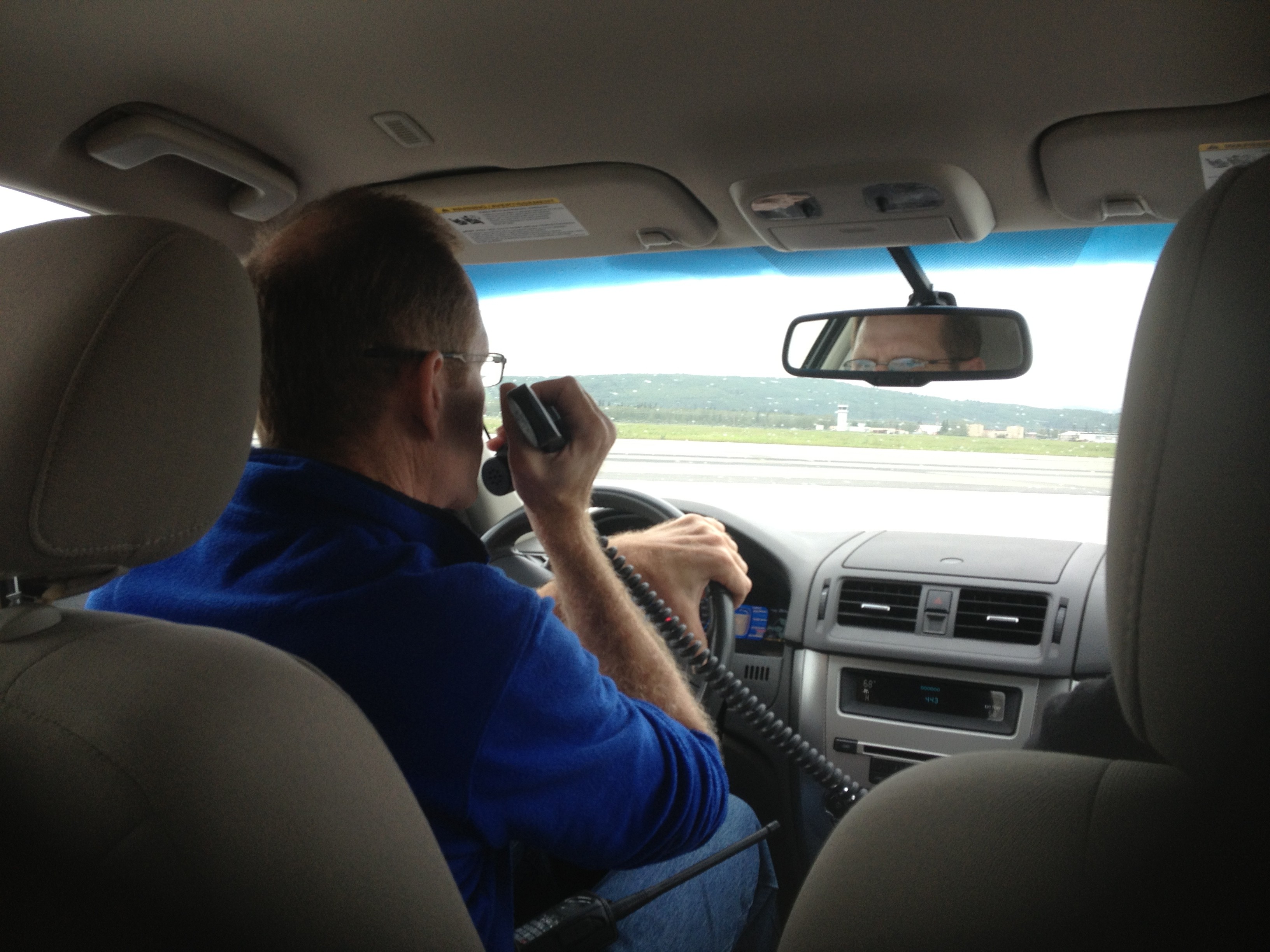 ER-2 pilot Tim Williams watches for the plane to land. (Credit: Valerie Casasanto/NASA)