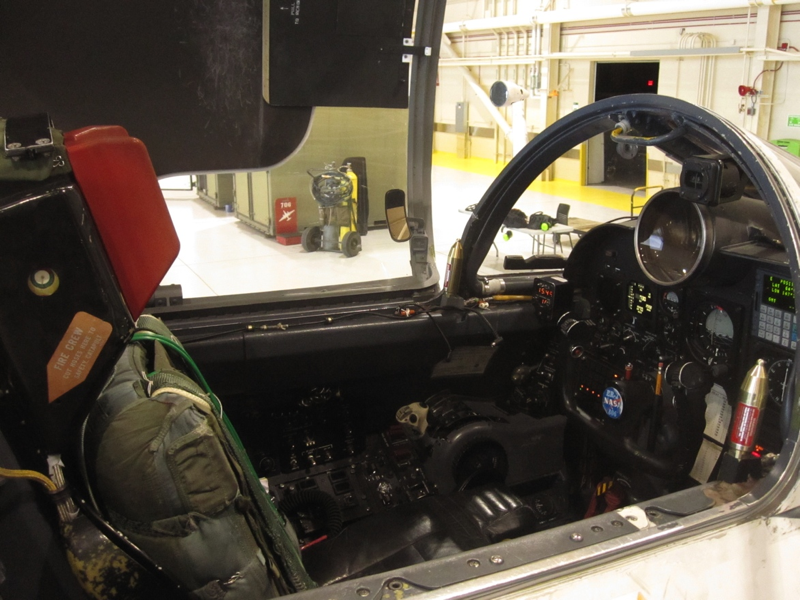 Engineer Technician Ryan Ragsdale, of NASA Dryden, inflates the pressure suit the day before to make sure there are no leaks. (No, there is not a real person in there!). Credit: Valerie Casasanto/NASA