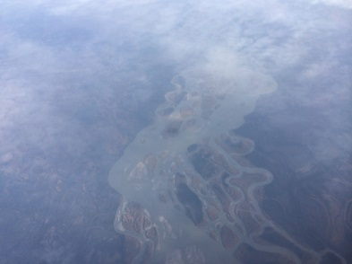 A view of the ground through clouds