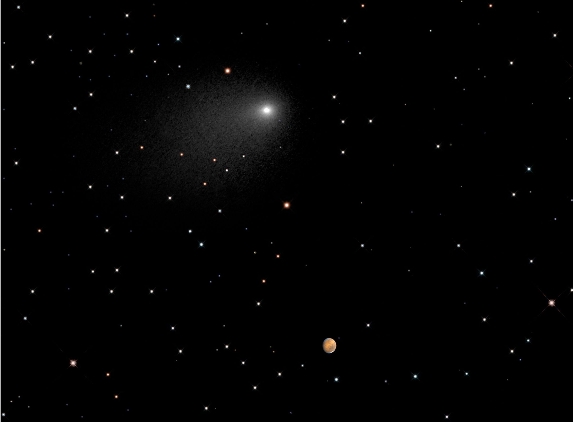 A comet with a tail streaking through space with small, orange Mars in the backgrounda along with many stars.