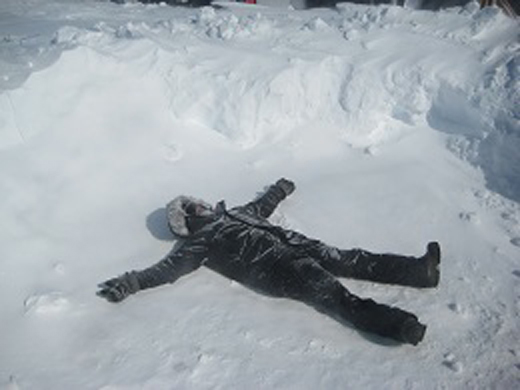 Josh relaxing after digging out the cook tent. 