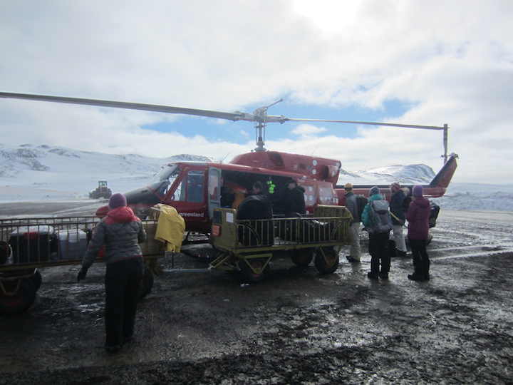 The team loads the final gear for the first flight.