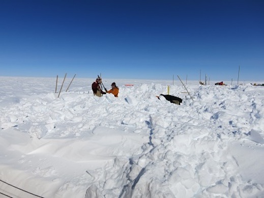 Clem and Olivia digging out the tents.