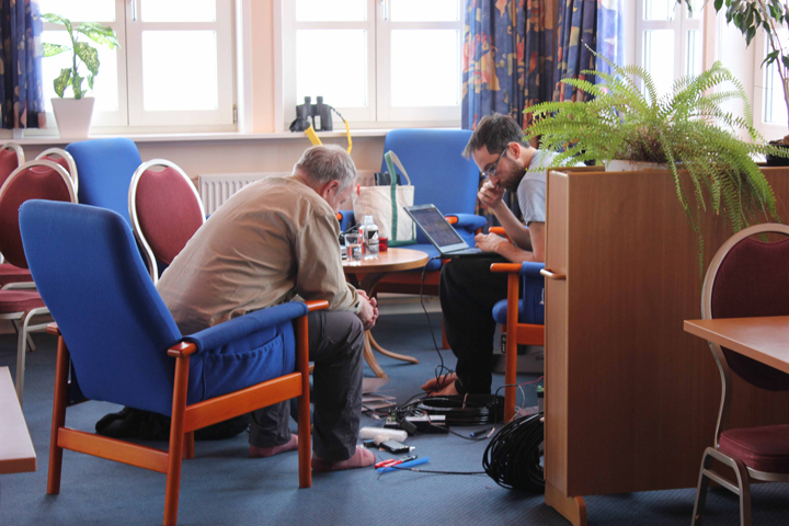 Kip and Clem working indoors during the bad weather on Monday.