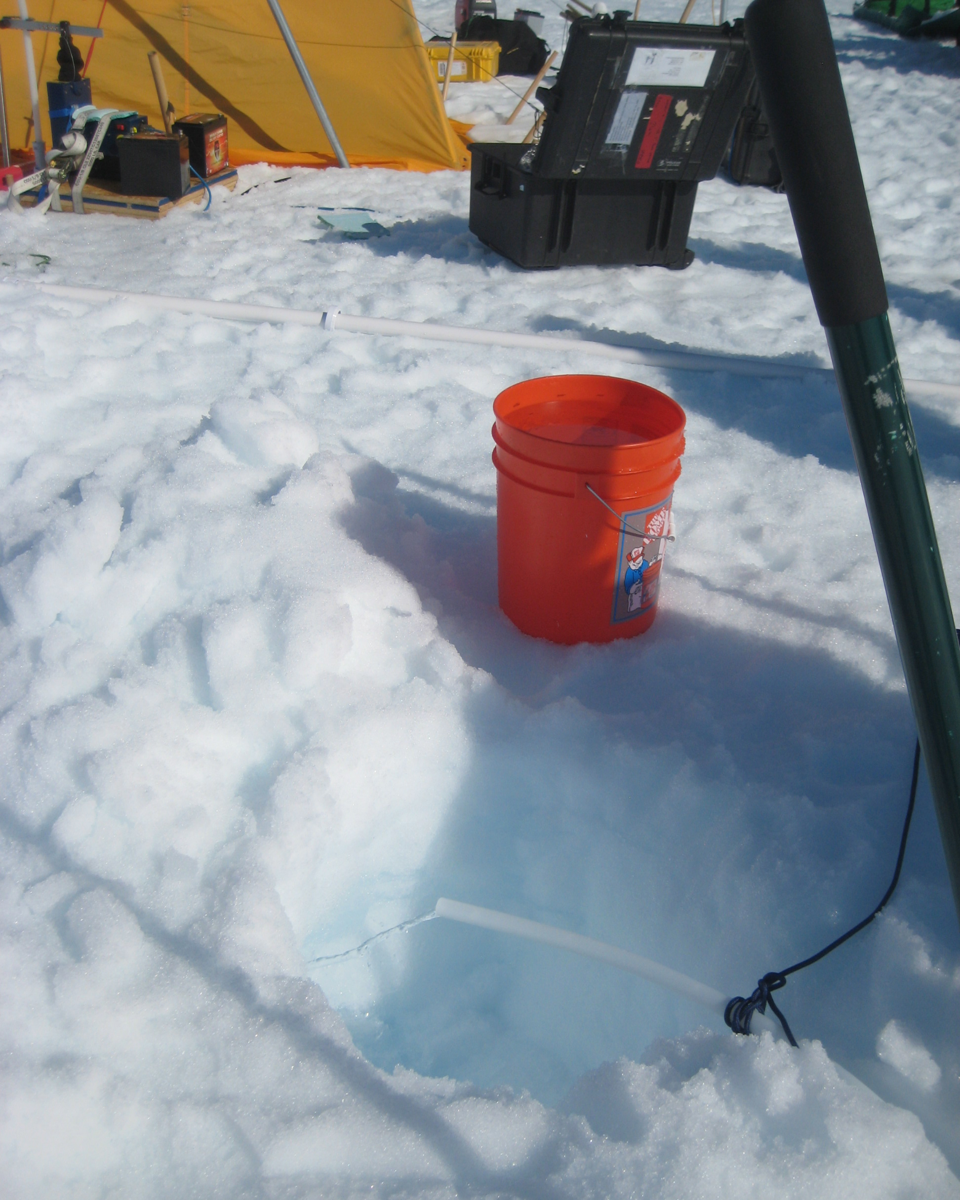 Pumping water out of the firn aquifer.