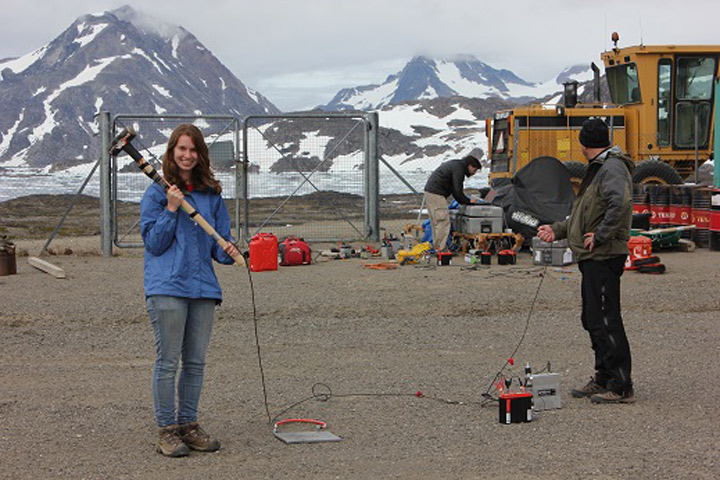 Lynn, Nick, and Anatoly testing out the seismic gear at the airport.