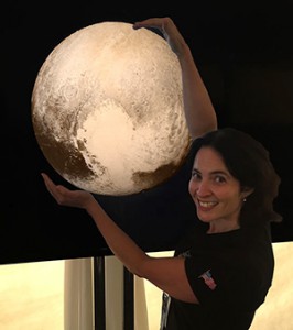 Carly with a model of Pluto