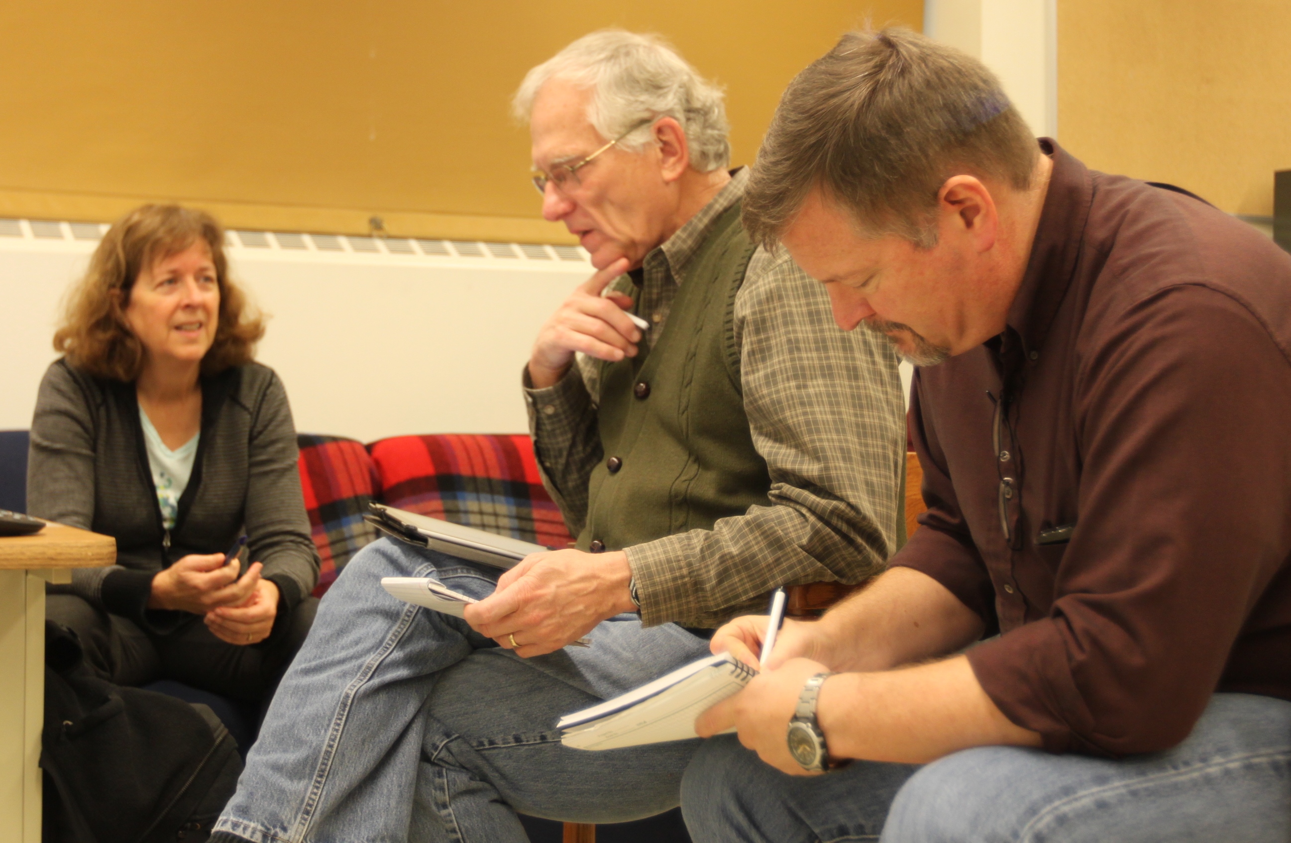 Lead OLYMPEX scientists and operations directors Dr. Lynn McMurdie, Prof. Robert A. Houze, Jr., and Dr. Walter Petersen (left to right) discuss the current situation during a morning briefing.