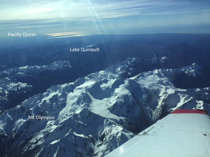 Photo taken from the ASO Lidar flight over the Olympic Mountains. Mt. Olympus, Lake Quinault and the Pacific Ocean are all visible in this image.