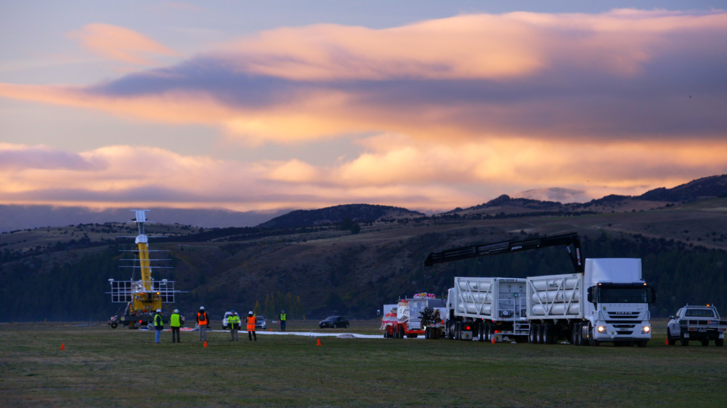 Sunrise at Wanaka Airport with a balloon payload ready to launch.