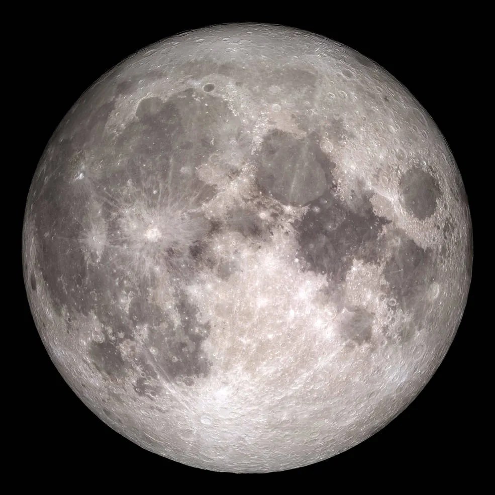 Craters are visible in the shades of gray and light on Earth's Moon.