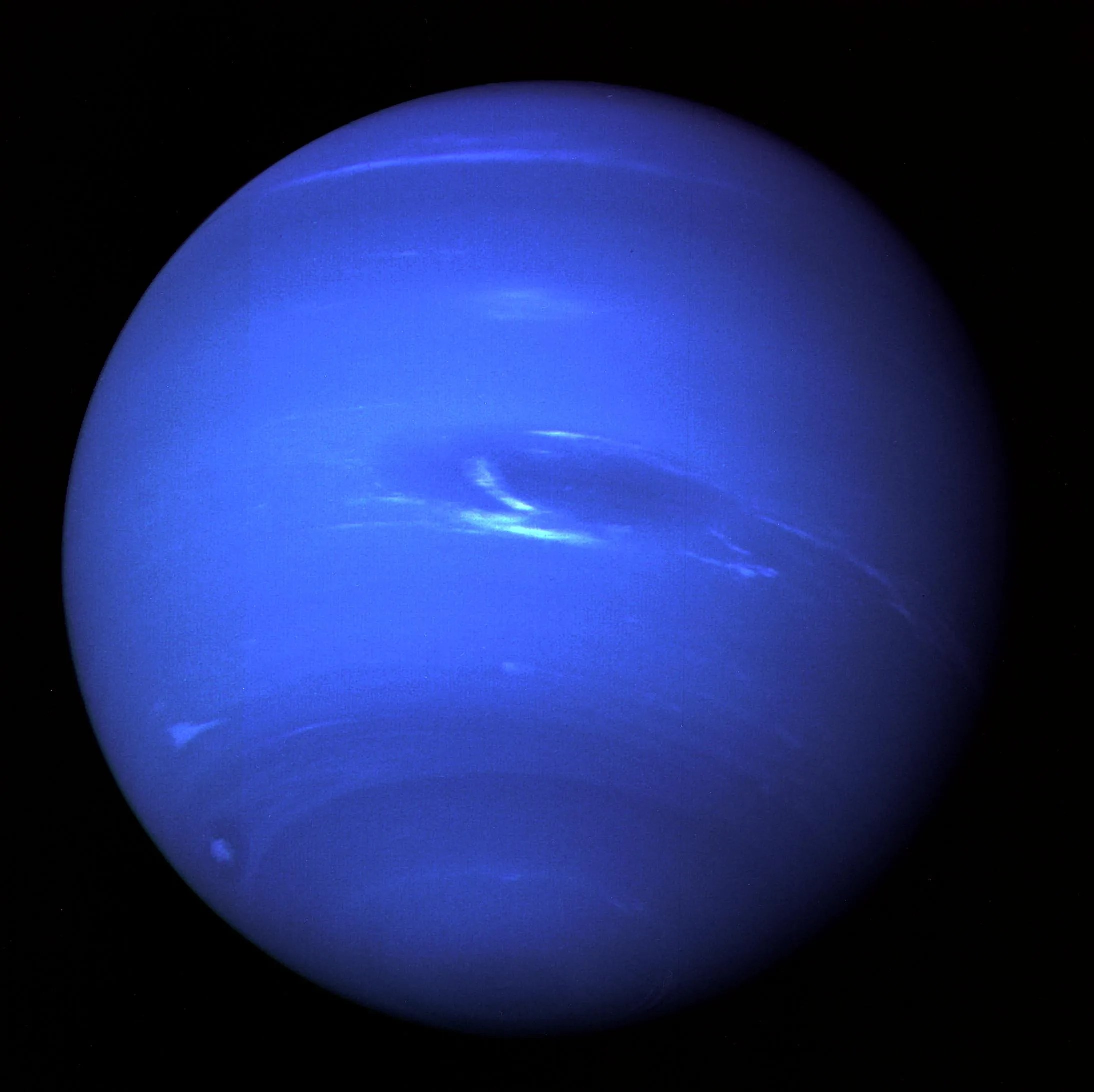 Neptune is bright, and deep blue in this image.