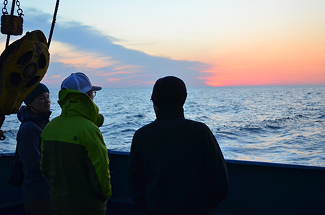 NAAMES-II Scientist enjoying the sunset on the aft deck of the RV Atlantis. Photo: Jack Porter