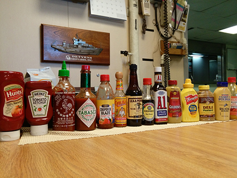 Condiments in a line.