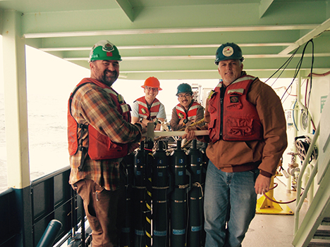 Representatives from UCSB’s ocean optics and microbial oceanography groups. Front, left to right: Stuart Halewood, Associate Development Engineer, and Craig Carlson. Back, left to right: James Allen and Nick Huynh, Graduate Student Researchers.  PC: Pete Gaube
