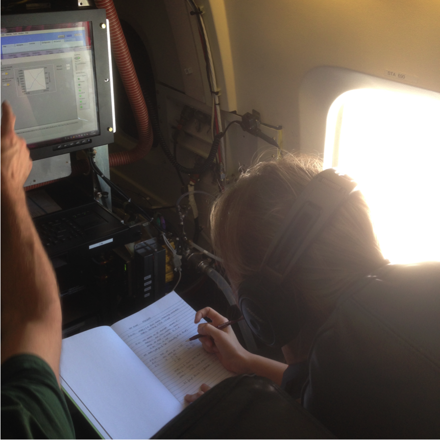 Agneiszka Kupc, research scientist with NOAA/University of Vienna, monitoring data during the first ATom test flight. (Credit: Christina Williamson)