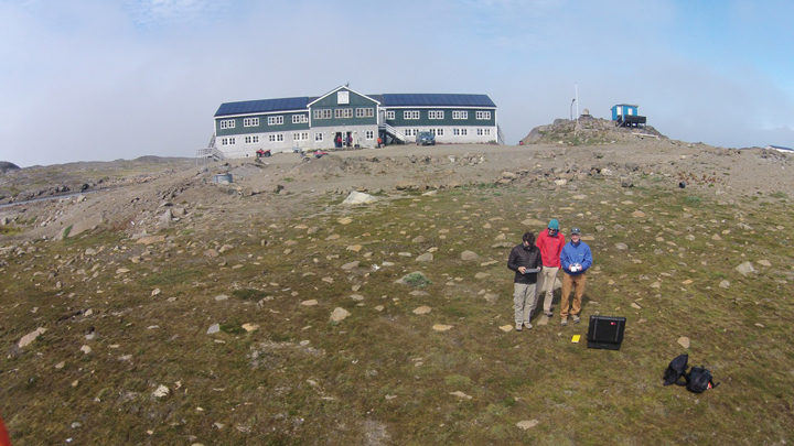 Photo from the drone: Nick, Stefan, and Rick in front of Hotel Kulusuk.