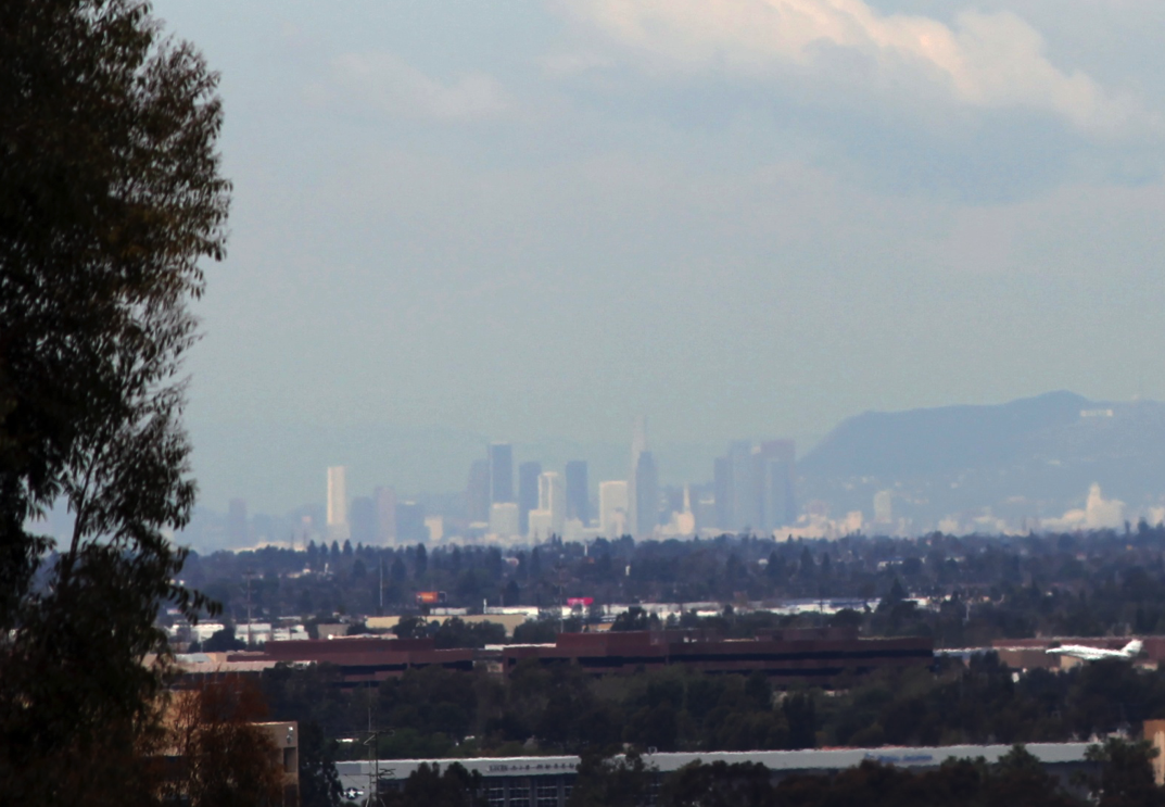 The Los Angeles skyline is hazy with smog generated from air pollutants emitted by cars. The air pollution doesn't stay in the city, however, but will eventually travel to other parts of the world. Credit: Michael Prather