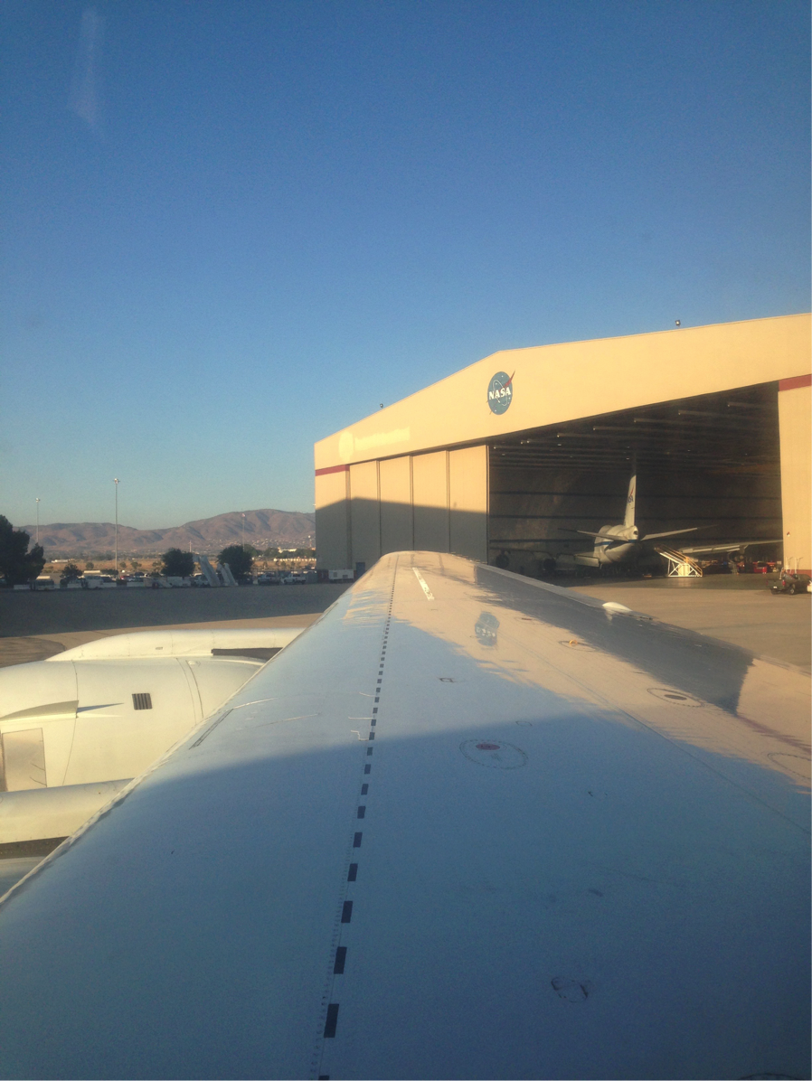 View from the DC8 back to the NASA-Armstrong hangar in Palmdale, California (Credit: Christina Williamson).